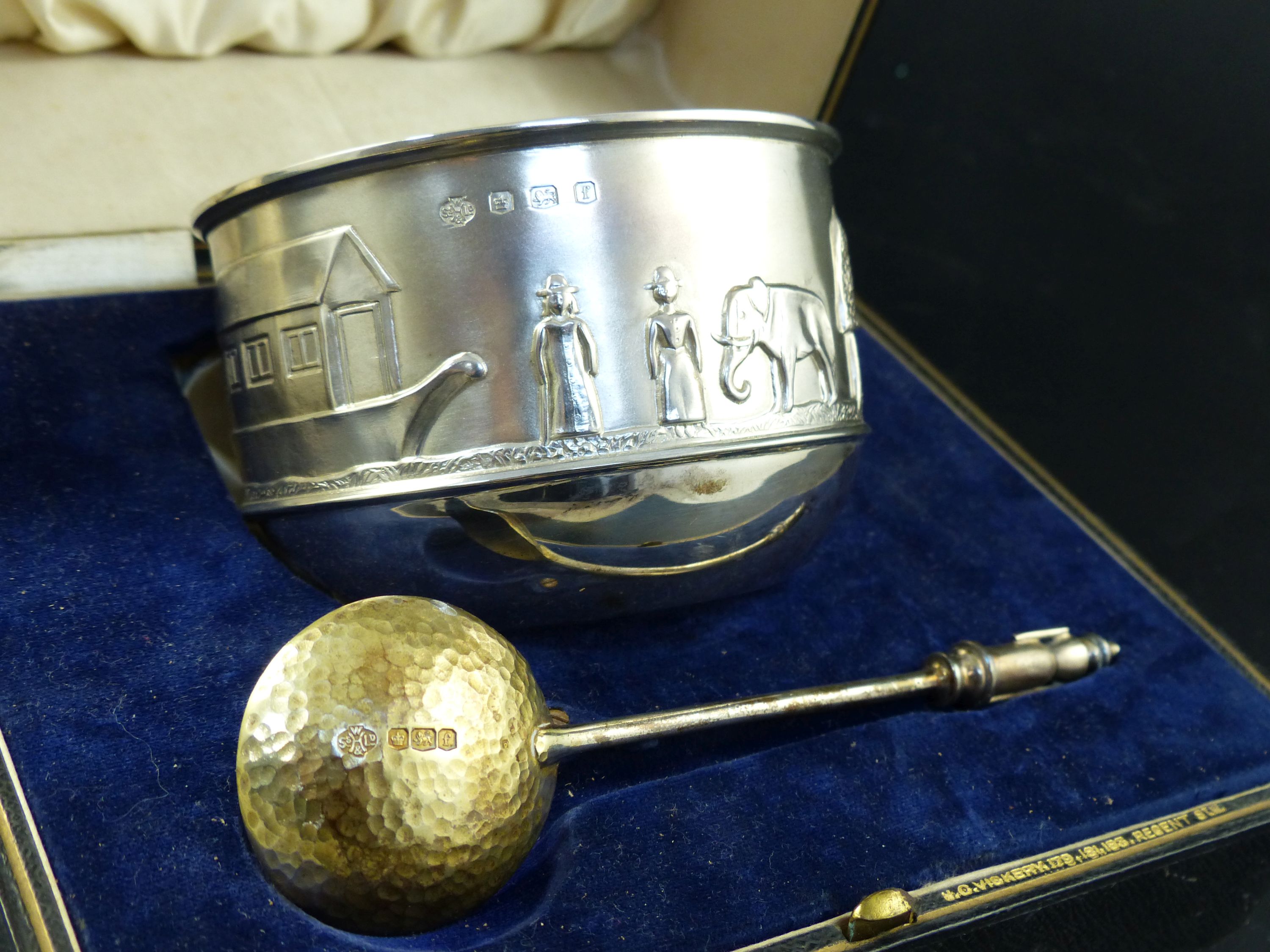 A George V cased silver Noahs Ark bowl and spoon, 7oz.